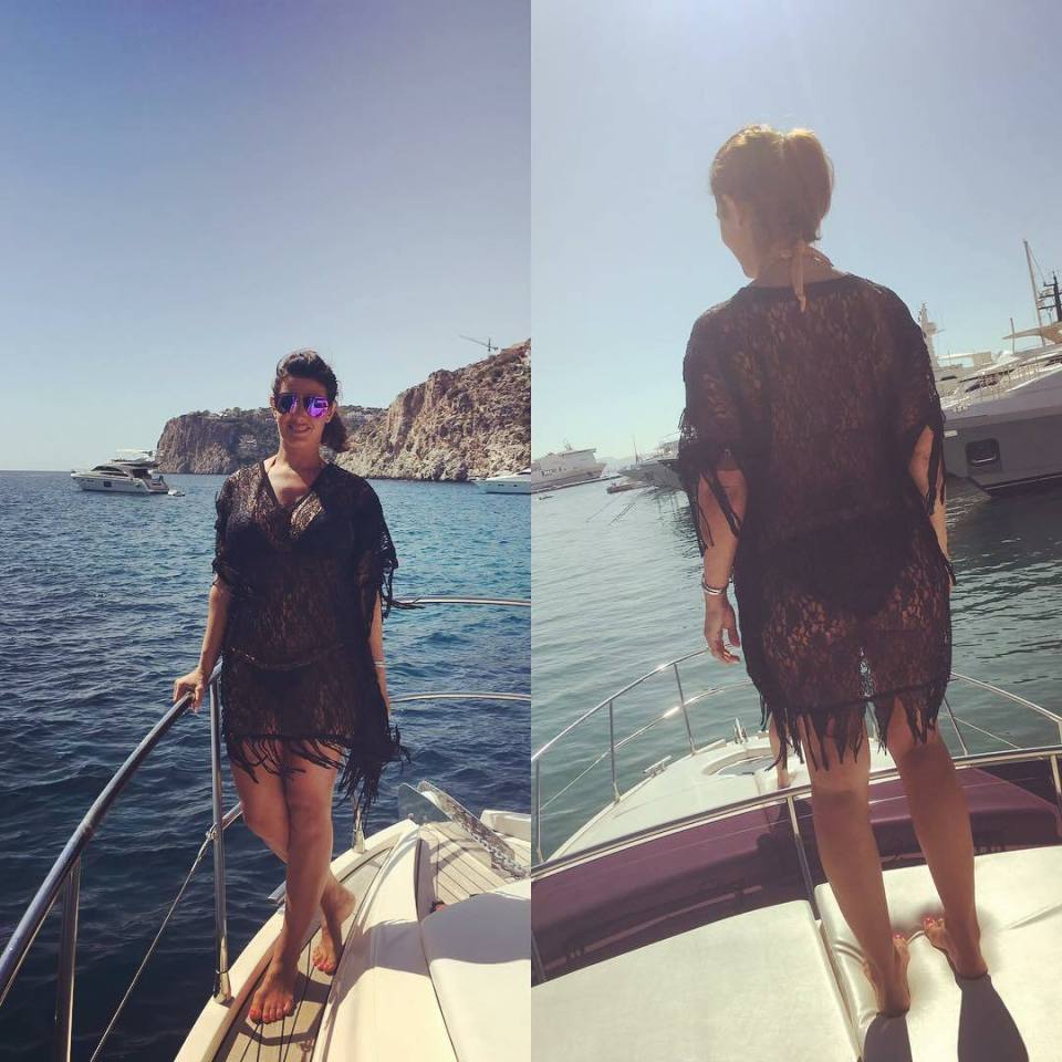 Rebekah poses on a yacht in Mallorca last week