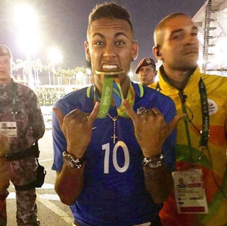 Neymar and his two watches from the Rio Olympics last year