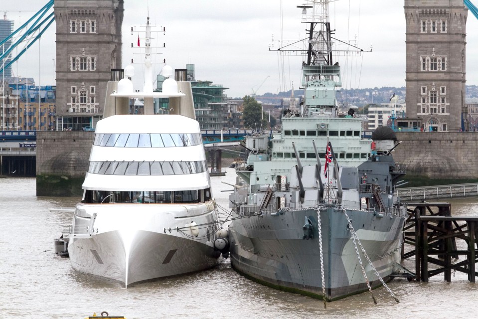 Russian tycoon Andrey Melnichenko's 390ft superyacht moored next to warship HMS Belfast