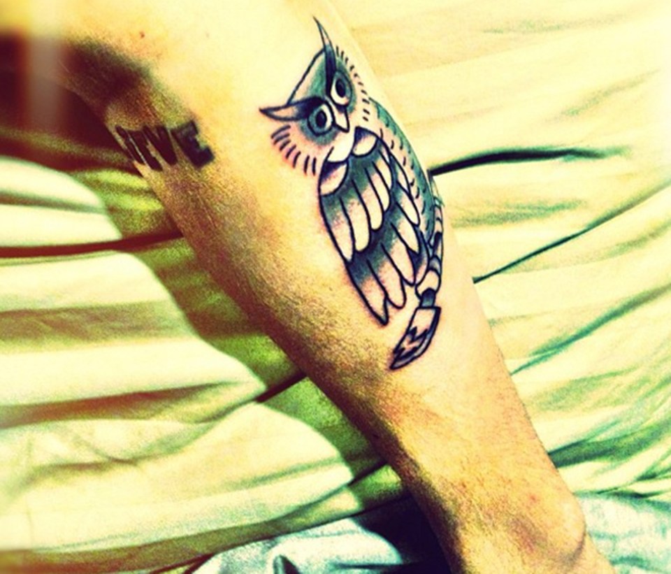 Justin Bieber has a questionable owl tat