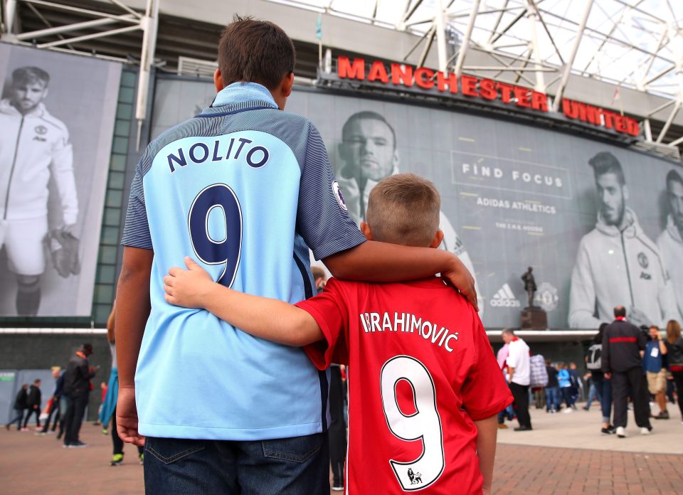 Fans of both sides flock to Old Trafford ahead of the derby today