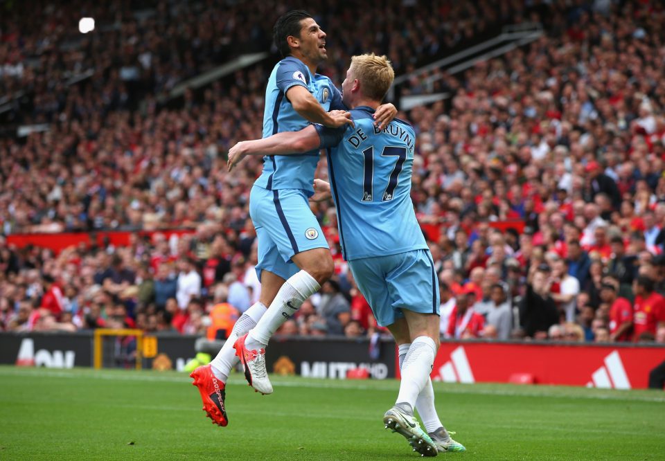 Nolito congratulates the City goalscorer after an impressive start