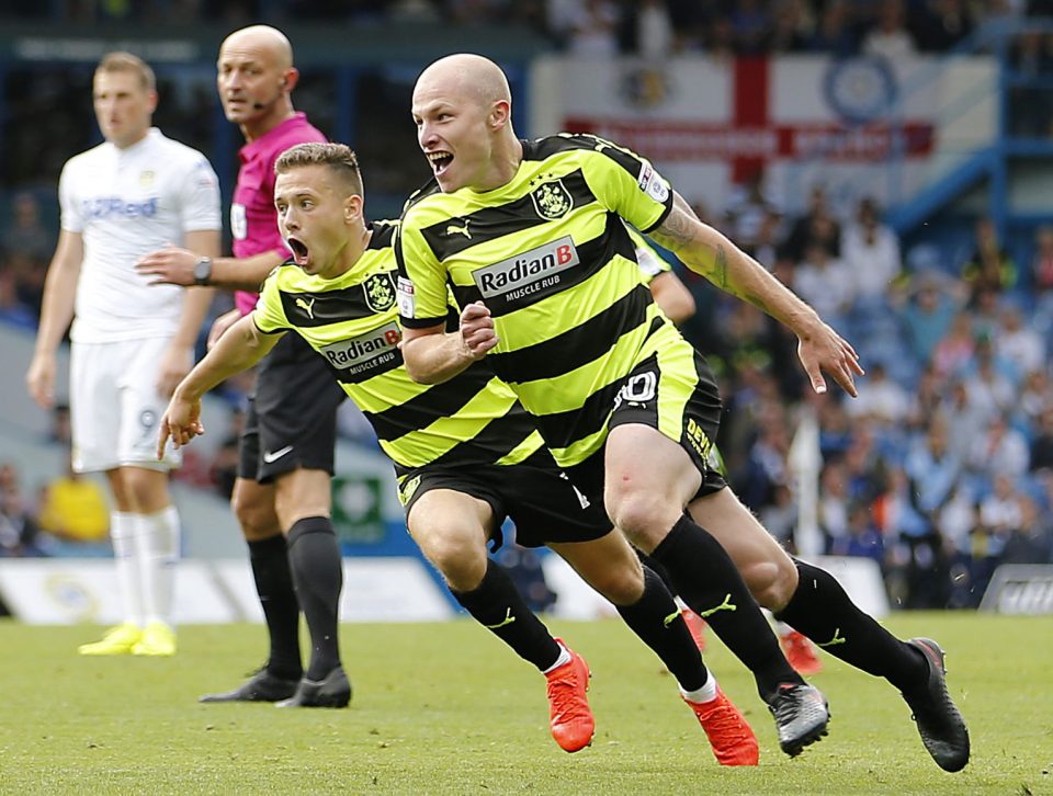 Aaron Mooy of Huddersfield Town celebrates scoring his teams first goal