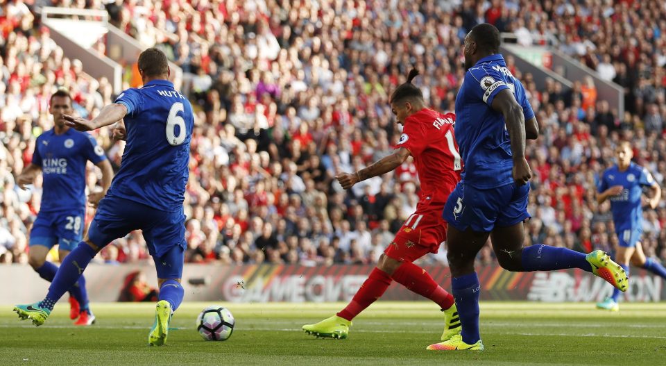 Roberto Firmino steers Liverpool in front early on against champions Leicester