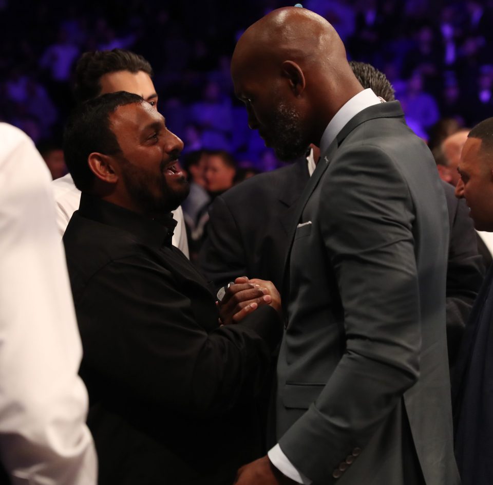  Ex-boxers Prince Naseem Hamed and Bernard Hopkins embrace ringside ahead of Kell Brook v Gennady Golovkin