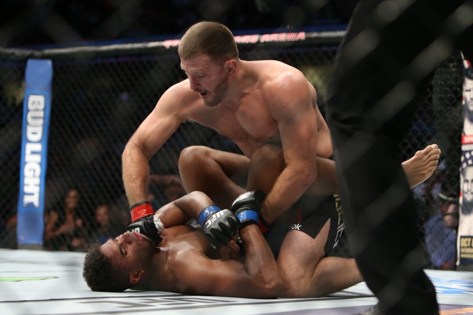  Out cold: Stipe Miocic knocks out Alistair Overeem with ground strikes in the main event of UFC 203