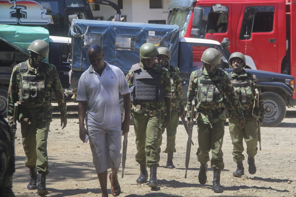 Kenyan soldiers arrive at the Central Police Station in Mombasa where three women were shot dead