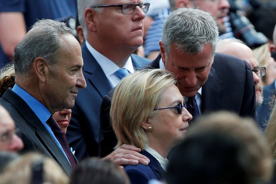 Democratic presidential candidate Hillary Clinton spoke with New York Mayor Bill de Blasio at the service