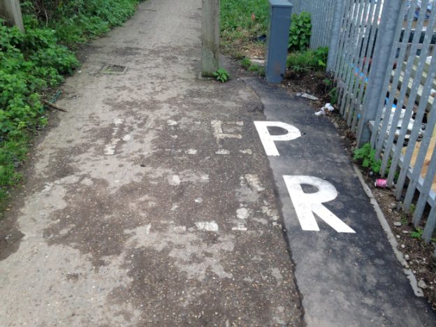  Job half done ... the words “Keep Clear” have only the P and R painted after a section of pathway near Marriott’s Way, Norwich