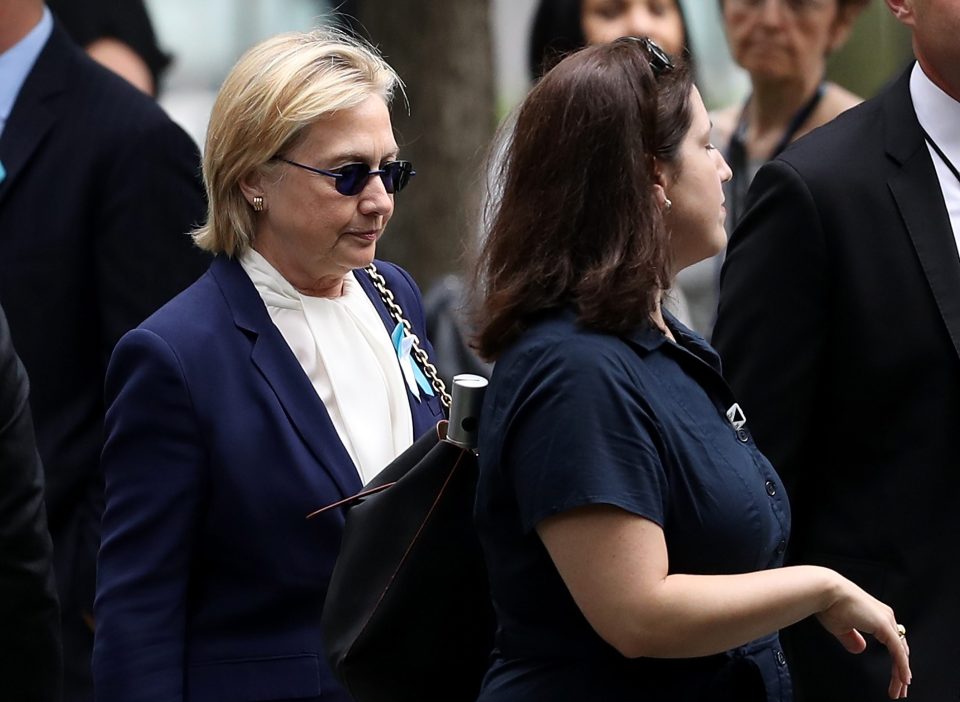  Clinton left a 9/11 memorial service early after falling ill with pneumonia