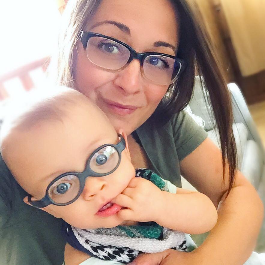  Jaxson, pictured 11 months after being born, has to wear glasses