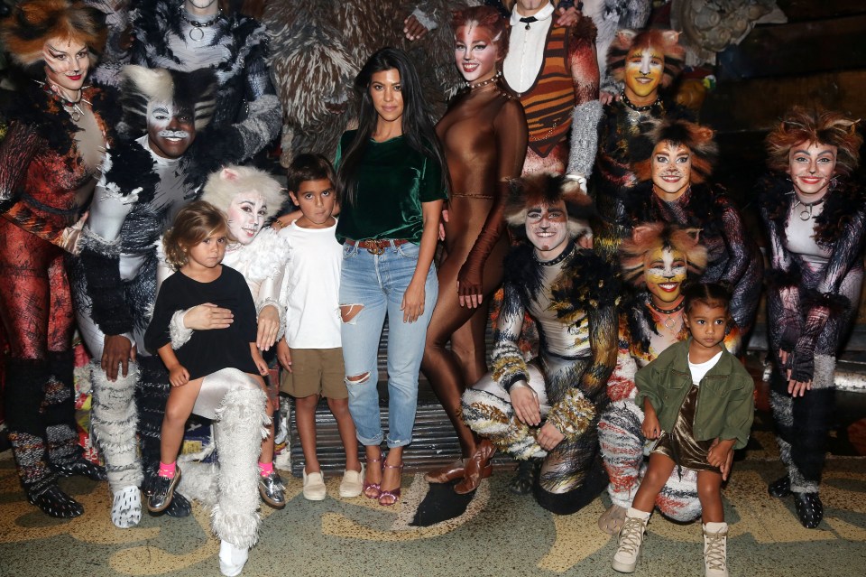  Mason and Penelope Kardashian and cousin North West looked totally unimpressed when Kourtney Kardashian took them backstage at Cats