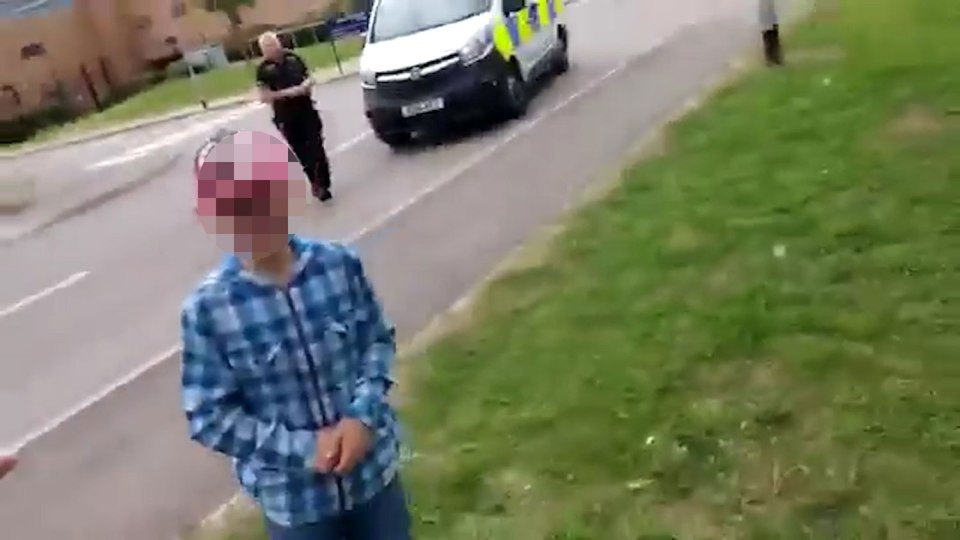  A terrified young boy with the unidentified man begins crying during the confrontation