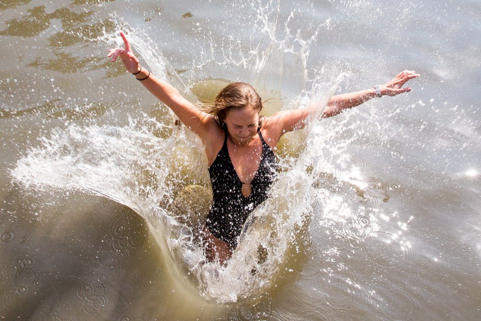  Alex Cocking cools off in Hampstead Heath mixed bathing bond in London today