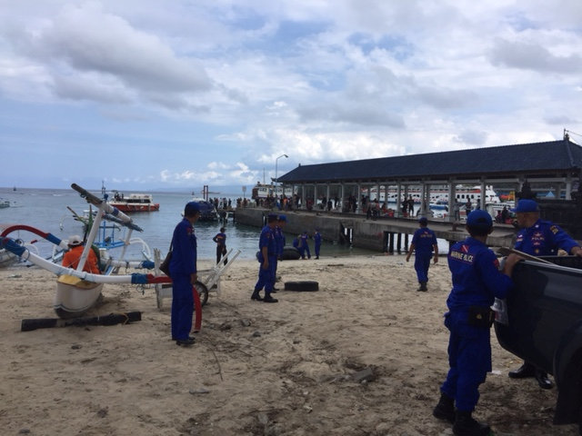  Bali Police and a bomb squad waiting for the boat to arrive