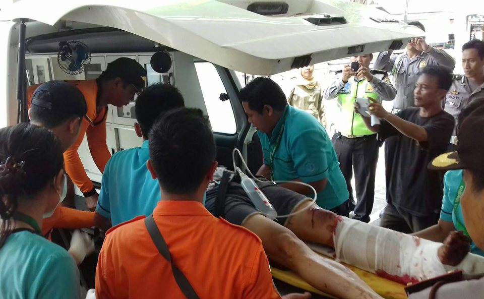  Emergency services tend to an injured tourist