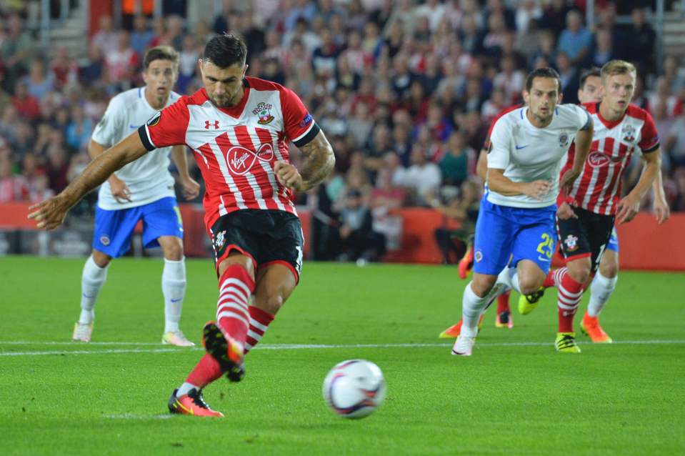  Charlie Austin opens the scoring from the spot just minutes into the game