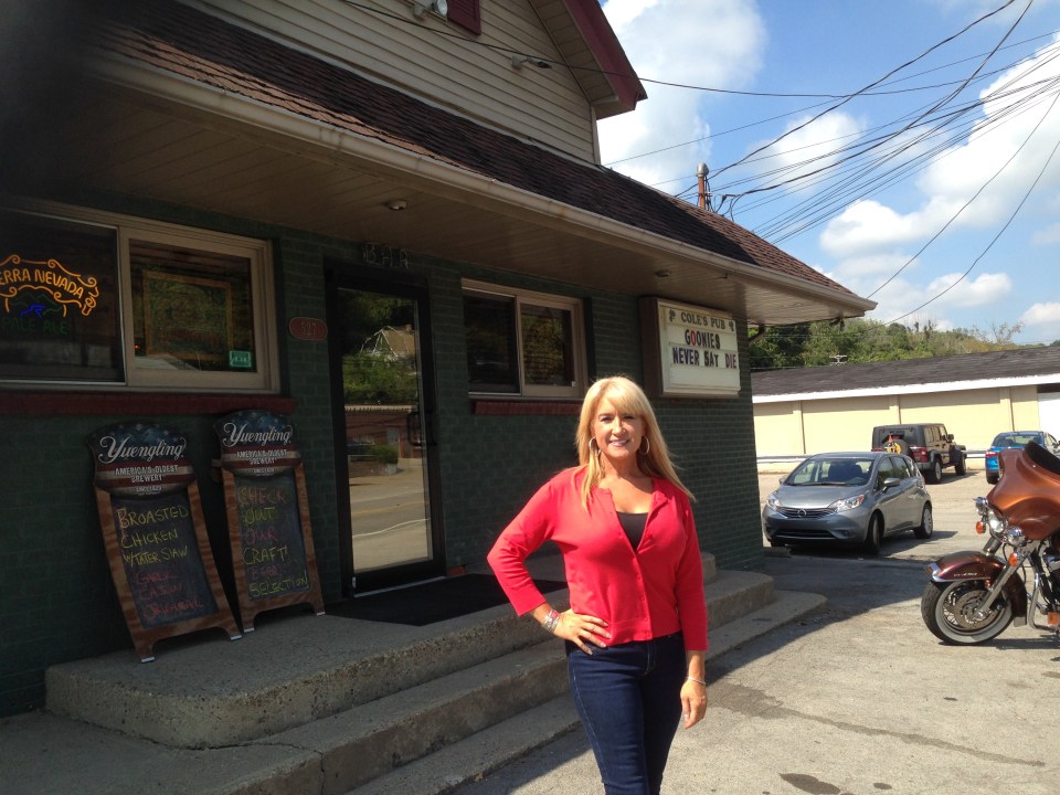 Kelly Cole outside Cole's Pub, Imperial, Pittsburgh.