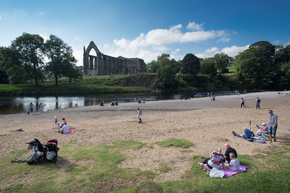  Members of the public enjoy the sunshine, at Bolton Abbey, beside the River Wharfe, in Wharfedale, North Yorkshire Seasonal weather at Bolton Abbey, North Yorkshire, as the last of the summer sun peters out this week