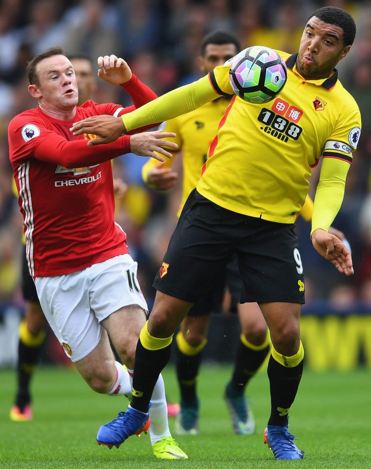  Deeney holds off Wayne Rooney in Watford's 3-1 triumph over Man United