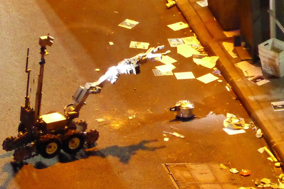  New images have emerged of a bomb disposal robot approaching a pressure cooker explosive in Manhattan on Saturday