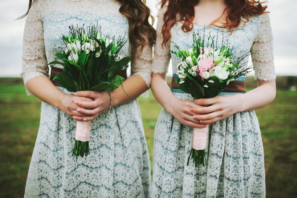  The woman is struggling to pick between her sisters