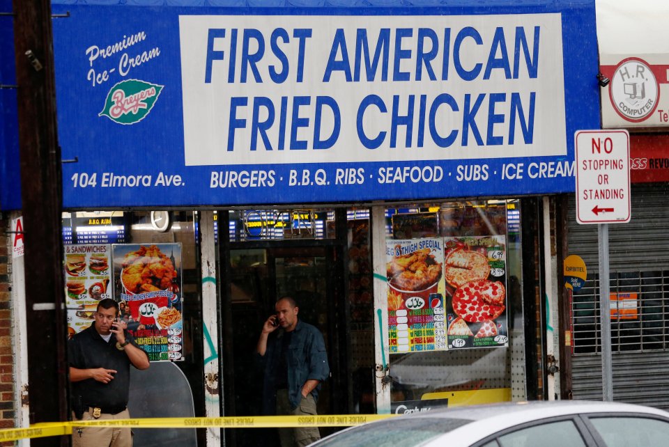  Law enforcement officers raid the New Jersey business owned by terror suspect Rahami