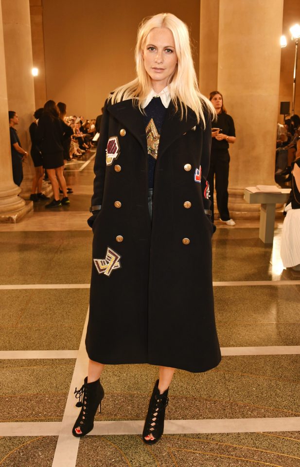 Poppy Delevingne arrived in a long military style coat 