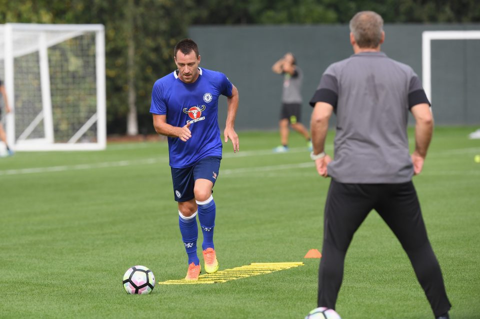 John Terry does ladders during training as he steps up his rehab from an ankle injury