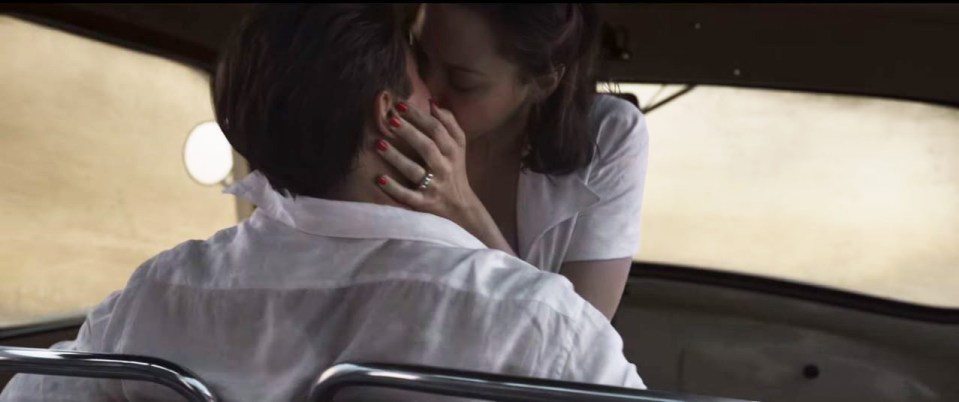  Brad Pitt and Marion Cotillard share a passionate kiss in their upcoming film, 'Allied'