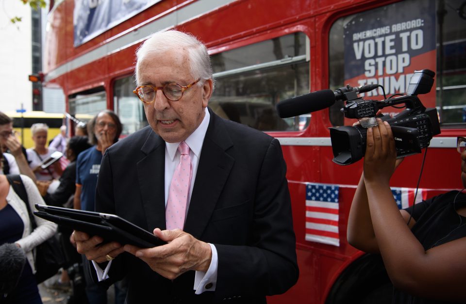  US law professor Michael Dale registers to vote as the Stop Trump campaign bus takes to the road