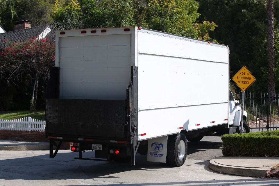 The vehicles rolled in at their former family home