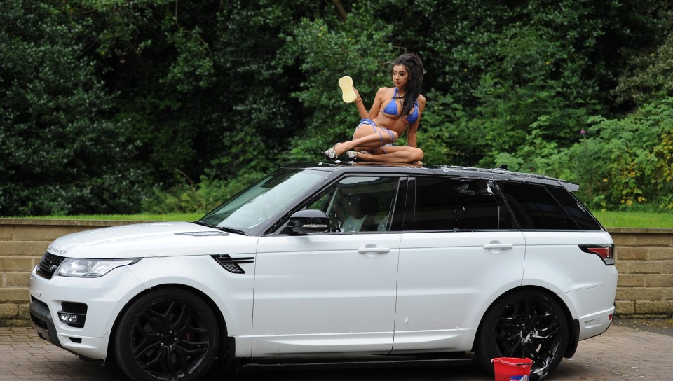  Chloe got wet and wild as she soaked down her snazzy white car