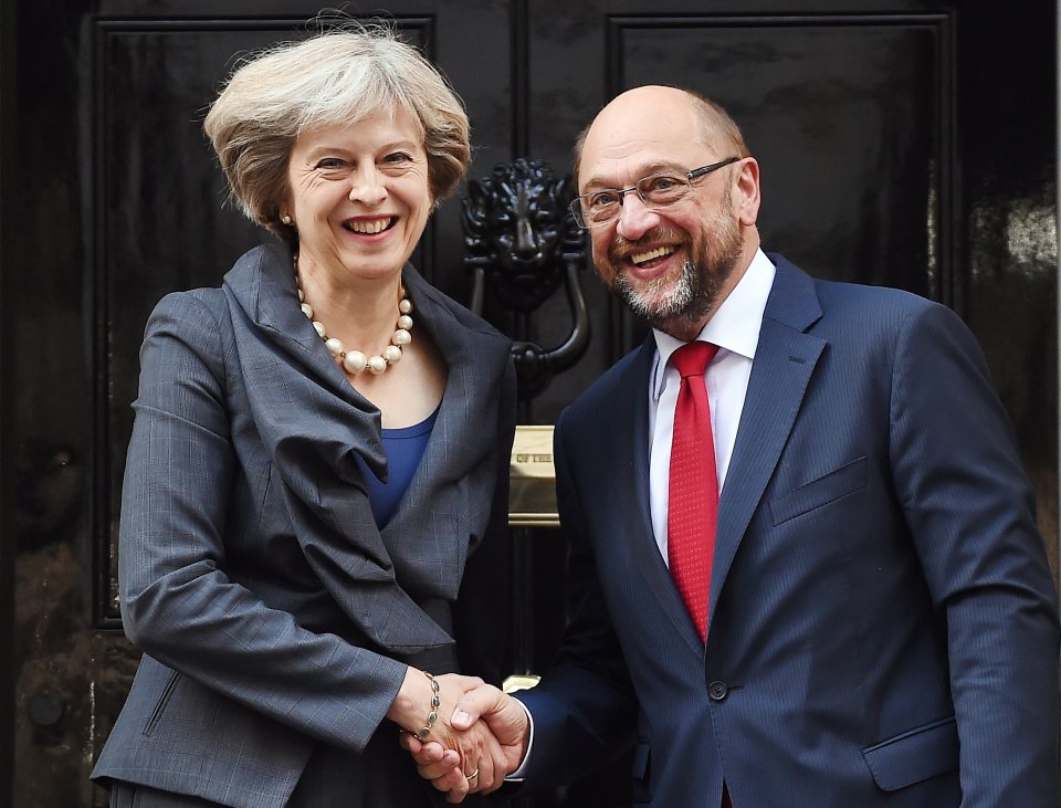  Pair are all smiles for the cameras but Martin Schulz has some tough words for Theresa May