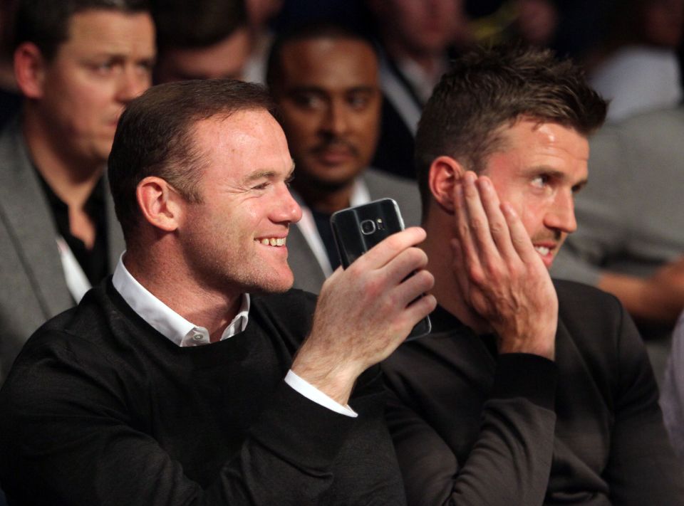 Rooney's mood lightened up somewhat when he was joined by team-mate Michael Carrick