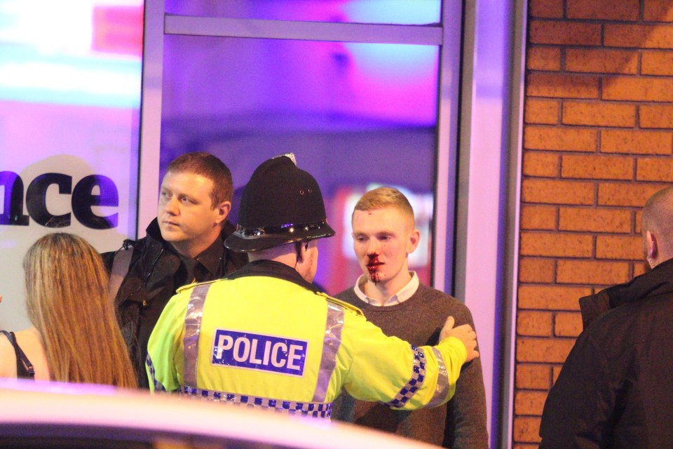  One young man could be seen with blood streaming from his nose after scuffles in the early hours