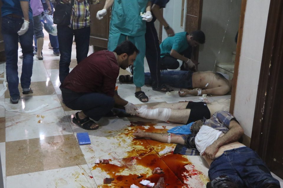 Blood runs across the floor in the strife-hit hospital