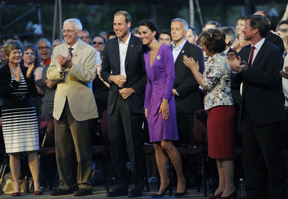  Later in the evening she changed into a regal purple frock by Issa