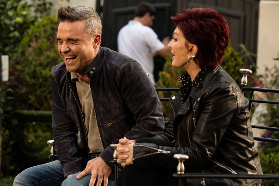 Sharon Osbourne also has a good giggle with her guest judge, Robbie Williams