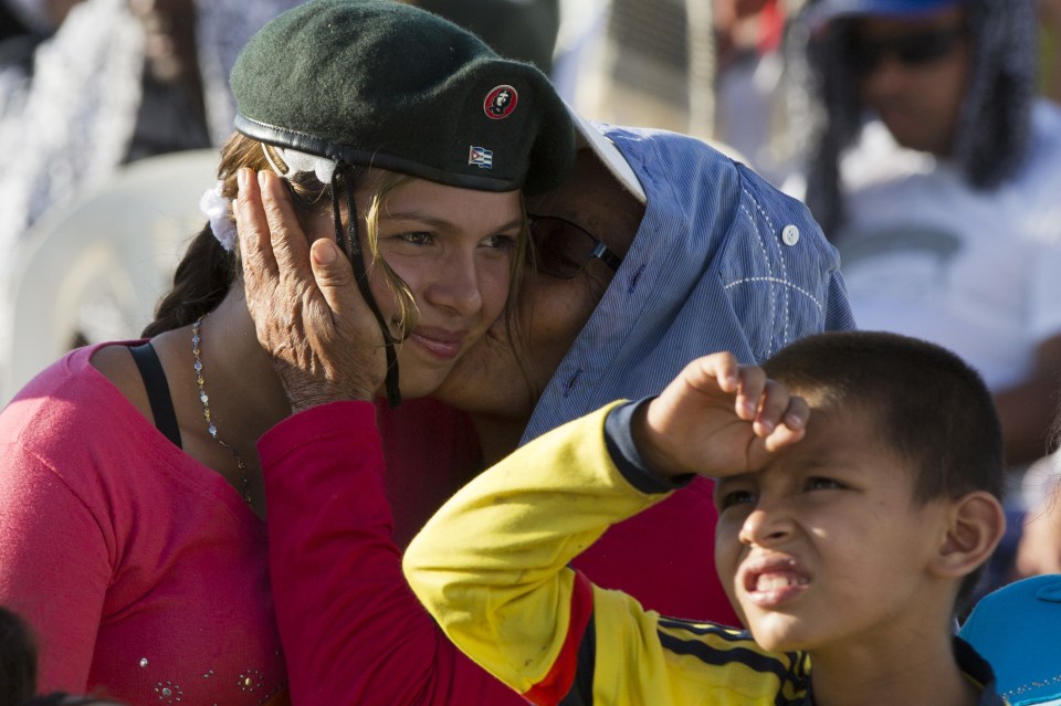  Tatiana, a rebel of the Revolutionary Armed Forces of Colombia, FARC, is kissed by her grandmother during an event organized by the FARC in the Yari Plains of southern Colombia