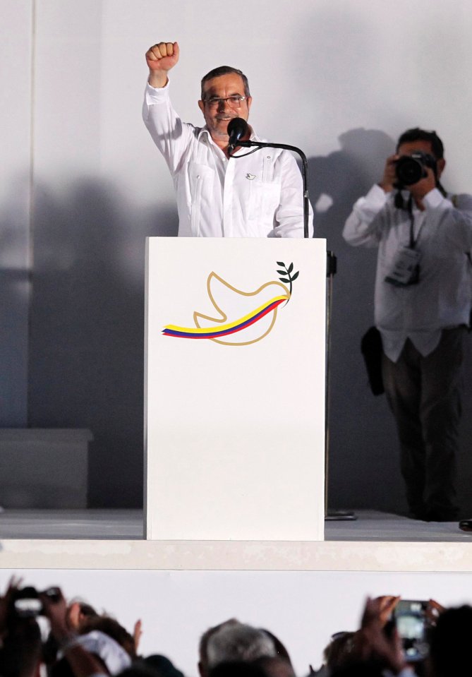  Marxist FARC rebel leader Rodrigo Londono, Timochenko, addresses the crowd at the historic event