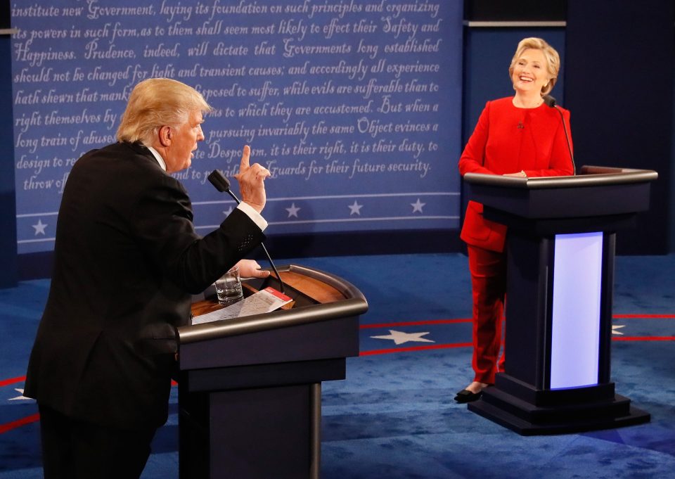  Hillary Clinton and Donald Trump traded blows on the debate stage Monday over the Democrat's use of a private email