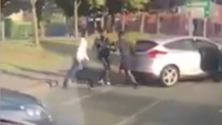  The horrific brawl took place on one of Manchester's busiest roads, Princess Parkway