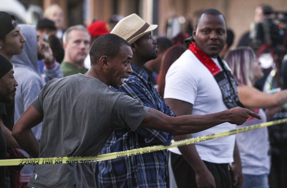 Protesters reacted with fury after a young black man was gunned down by police in the Californian town of El Cajon