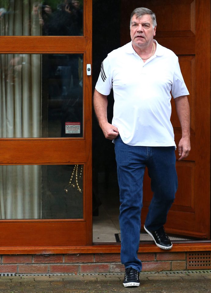  Sam Allardyce emerged from his home before being driven away inside a car