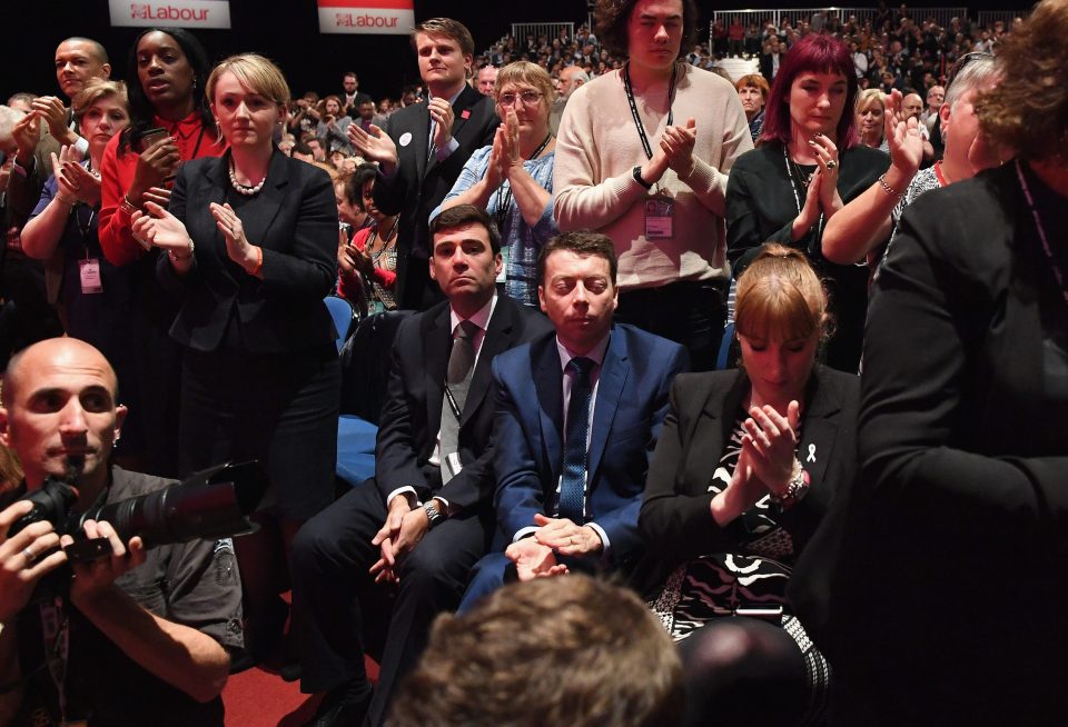  Andy Burnham, Iain McNicol and Angela Rayner remain seated as Labour party leader Jeremy Corbyn repeated his apology for the Iraq War during his keynote speech at the ACC