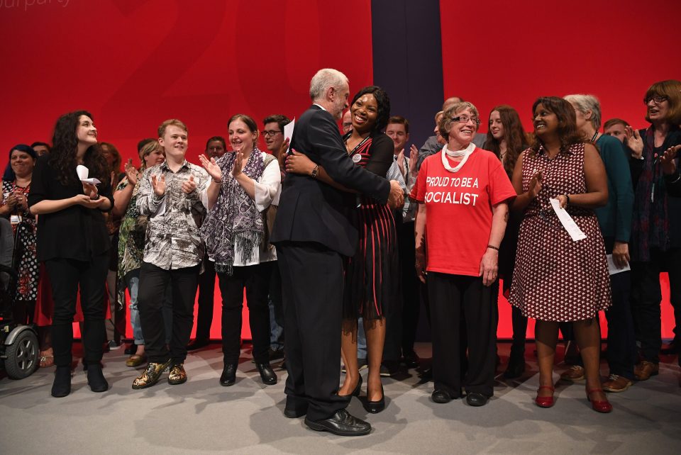  Labour Party members go on the stage to congratulate their leader as the conference comes to an end for another year