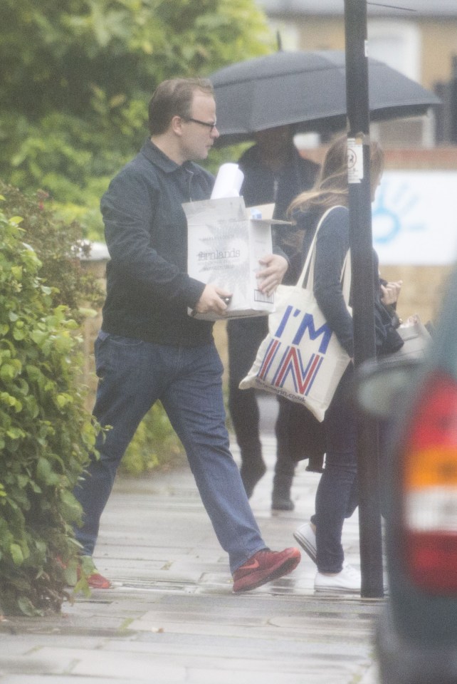  Coming out . . . loved up pair shopping with campaign bag