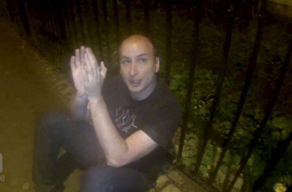  Ager slumps against park railings after he is apprehended by paedophile hunters