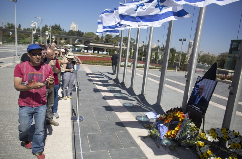 Thousands of mourners came to the Knesset to pay their respects to the former PM